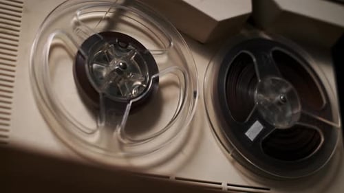 Vintage Reel-to-Reel Tape Recorder Spinning Reels