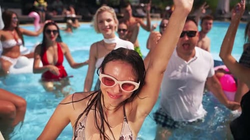 Boyfriends and Girlfriends Enjoy Summer Weather at Pool Party in Luxury Club Men and Women Smile