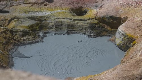 Bubbling Mud On Mudpot In Bolivia. - close up shot