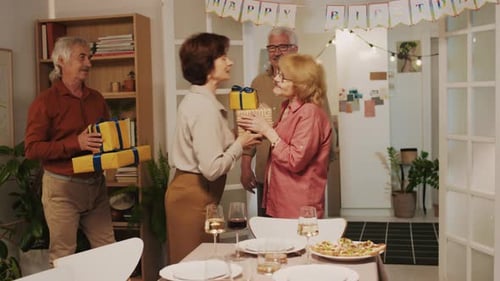 Birthday Gift Exchange Among Friends in Home