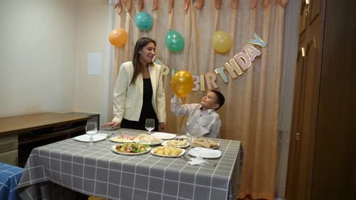 Mother and Son Celebrate Birthday at Home