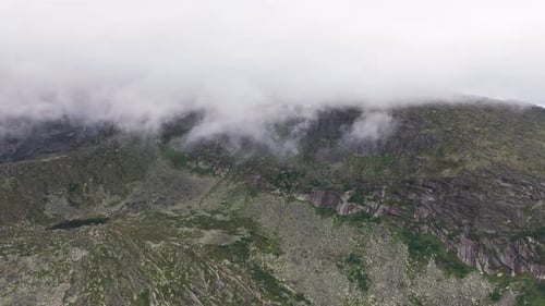 Fog Rolling Over Mountain Range