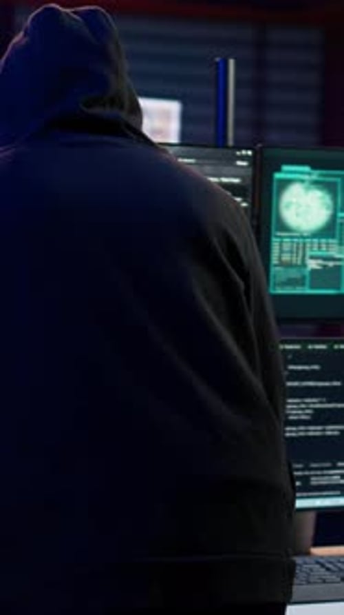 Vertical Video Scammer in Apartment Starting Work on Dangerous Script That Can Breach Security