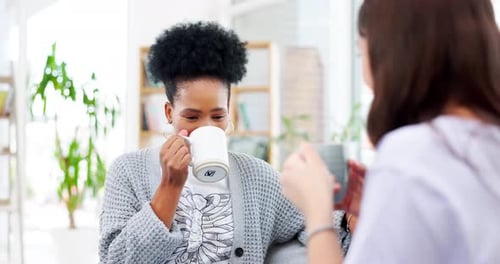 Women Friends Enjoy Coffee Together at Home