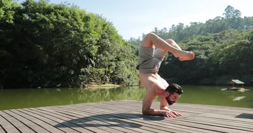 Man training Yoga outside