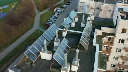 Aerial View of Modern Residential Buildings with Solar Panels on the Roof