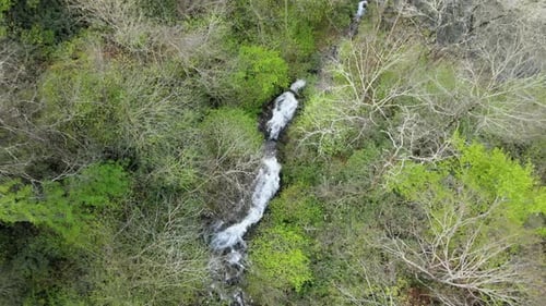 4K Aerial View of Waterfall In Spring