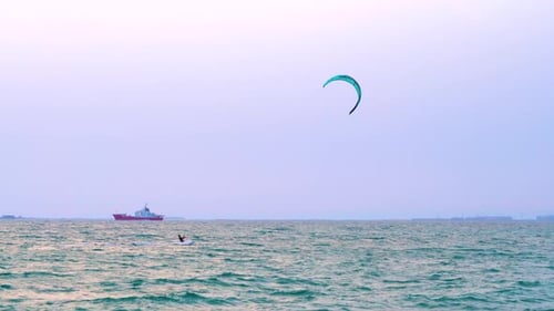A lone kite surfer enjoys the wide open waters of Kite Beach in Dubai