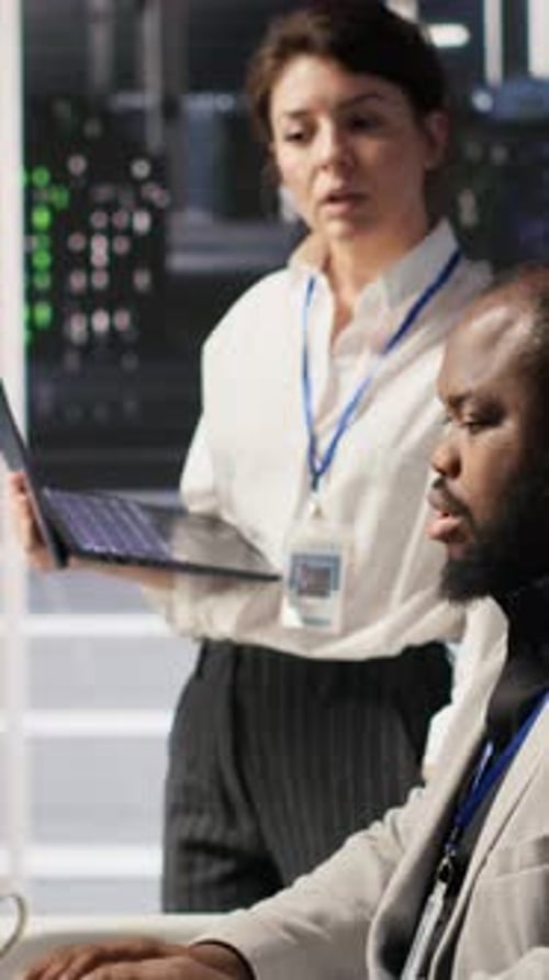 Vertical Video Happy Data Center Manager Providing Positive Feedback to Engineer