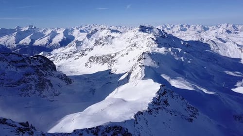 Aerial flight above stunning Alps.