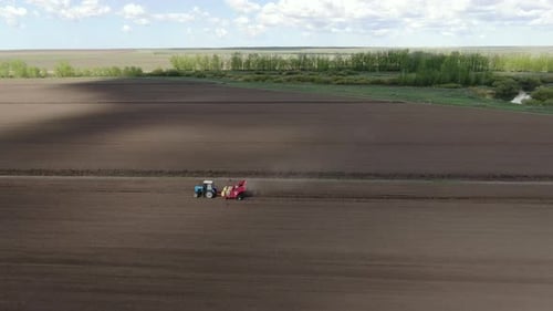 Agricultural Work In The Field In Spring