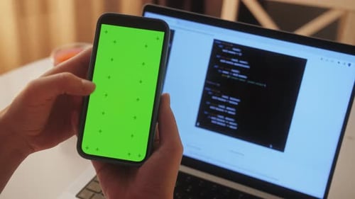 Phone with Chroma Key Green Screen with Man Working with Chatbot AI Online Connecting with AI and