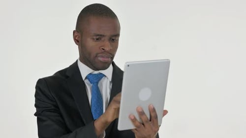 Man in Suit Using Touchscreen Tablet Device