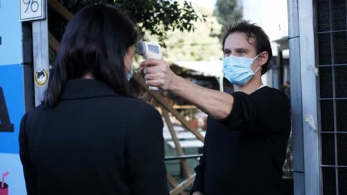Temperature Checks with Mask in Urban Setting