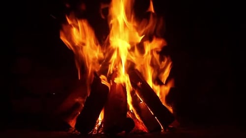 A large wood fire with flames