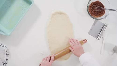 Rolling Dough Flat on Kitchen Counter