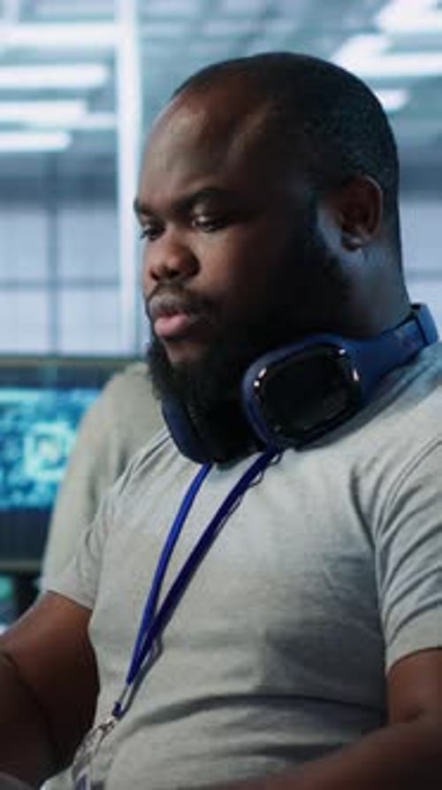 Engineer Tasked with Monitoring Data Center Supercomputers