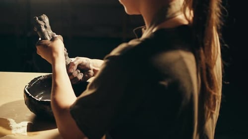 Woman Potter Works with Clay on Master Class in Studio Working Process in Ceramic Workshop Potter
