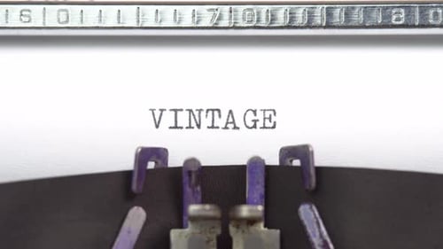 Typing the Word "Vintage" on Classic Typewriter
