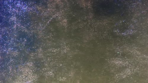 Abstract Glittering Dust Particle Background