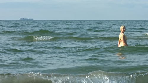 Woman Enjoying Ocean Swim on a Summer Day