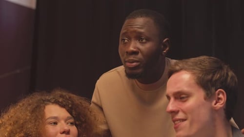 Friends Talking and Laughing Together in a Bar