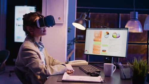Woman Uses VR Headset to Interact with Data