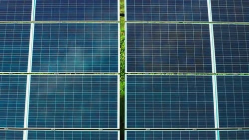 Aerial View of Solar Panels Generating Clean Energy