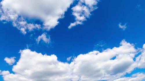 Clouds Floating in Vivid Blue Sky