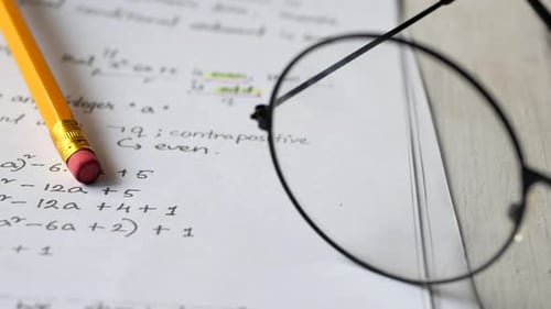 Hand Writing Algebra Equations on a Paper