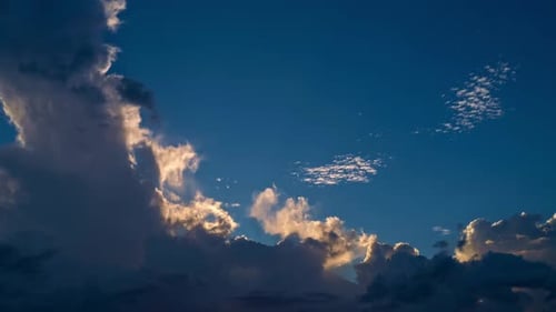 Majestic Clouds Rolling in a Deep Blue Sky