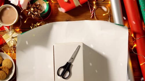 Top-Down Gift Wrapping on a Wooden Table