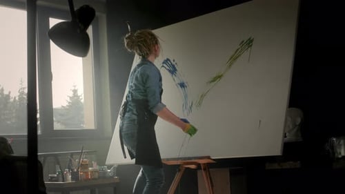 Artist Painting on Large Canvas in Studio with Hands