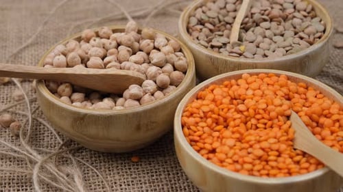Wooden Bowls Filled with Healthy Legumes