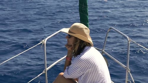 Pensive Woman Sailing Boat on Sea Adult