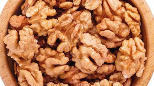 nuts in bowl on table, closeup