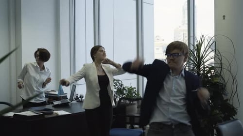 Business Colleagues Dancing in the Office