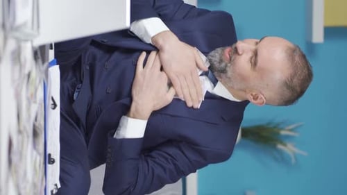 Vertical Video of Businessman in suit celebrating with money.