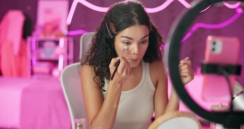 Woman, content creator and ring light for recording, cosmetics influencer