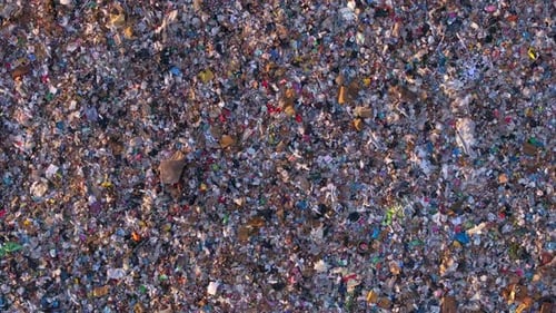 Aerial view of garbage landfill overflowing with waste, Albania.