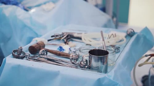 Surgical Instruments on a Blue Surgical Sheet