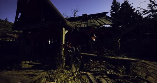 Mysterious Wooden Shack Zoom in Dark Forest Environment