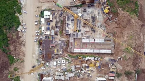 Large residential construction site with cranes, Aerial view