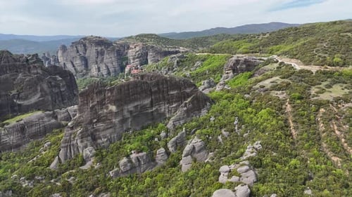 Flight over Meteora, monasteries and rock formation in Trikala, Thessaly. Greece