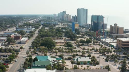 Myrtle Beach South Carolina. Oceanfront view of beach, sand, surf, ferris wheel and hotels. Famous v