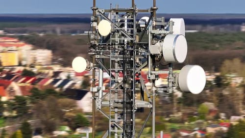Drone view around the GSM and radio telecommunication tower. Cell phone tower. Wireless communicatio