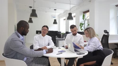 Multiethnic Business People During Meeting in Modern Office
