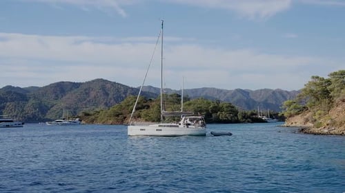 Beautiful Bay with Sailing Boat Yacht in Turquoise Sea Luxury Holidays or Sailing Regata Sports