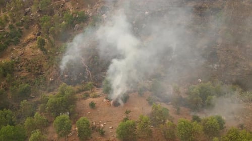 Wildfire Smoke Rises From Rural Hillsides