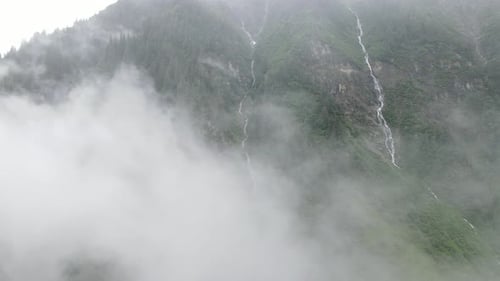 beautiful mountain with waterfall aerial